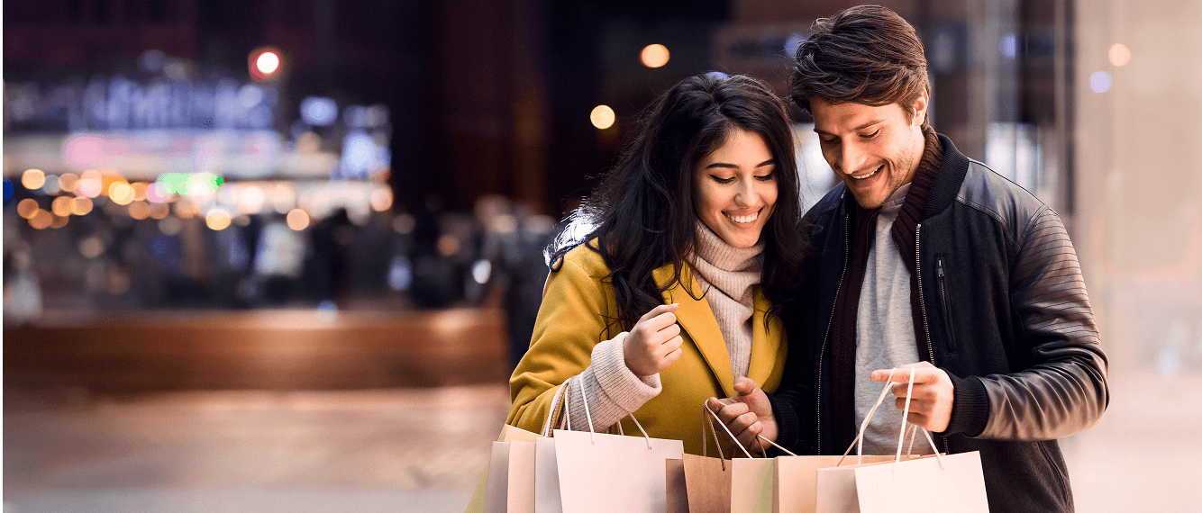 Happy shoppers with bags